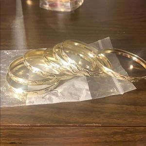 Laminated gol bangles for a 10 yr old girl